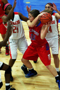 Junior Mariah Springer protects the ball on defense and attepmpts to push the ball up the court.